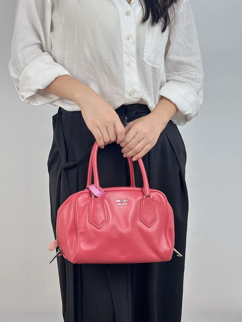 PRADA Crossbody Bag Crossbody Bag Pink Calfskin One Size 22 × 13 × 16 cm — on-model view 2 of 2
