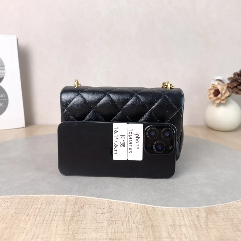 Chanel Crossbody Bag Black with Gold-Tone Hardware Lambskin Mini 18 × 5 × 12 cm — cover view 5 of 6