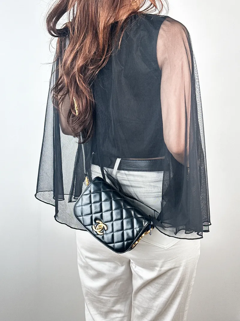 Chanel Crossbody Bag22a c Black Calfskinmini17.5 × 5.5 × 12 cm — on-model view 2 of 2
