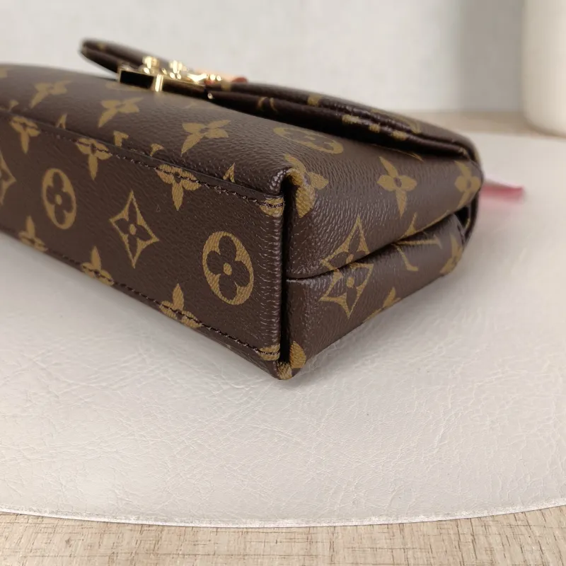 Louis Vuitton Crossbody Bag MADELEINE Monogram PVC nano 21 × 6 × 12.5 cm — detail view 3 of 12