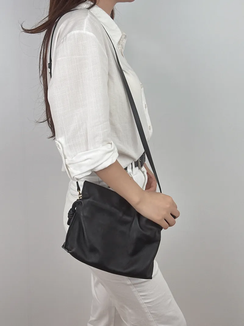 LOEWE Crossbody Bag Flamenco Black Calfskin Mini 24 × 9 × 18 cm — on-model view 2 of 2