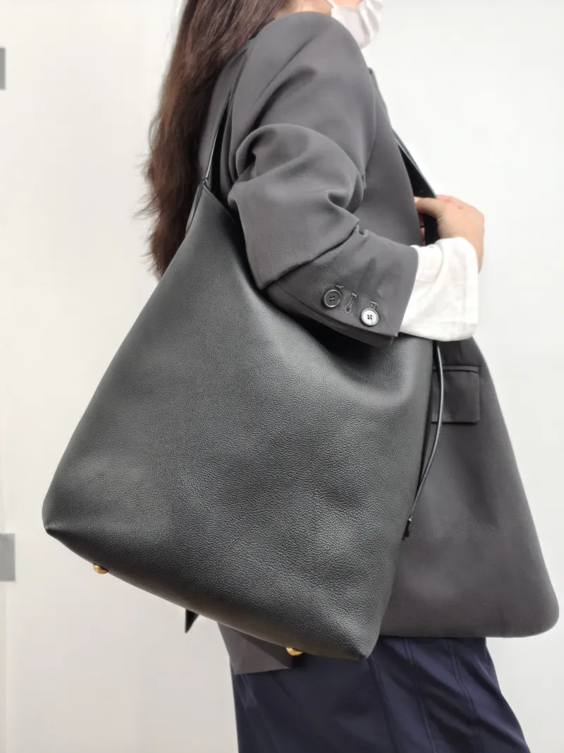 Louis Vuitton Shoulder Bag Low Key Hobo Shoulder Bag Black Calfskin Medium 31 × 18 × 35 cm — on-model view 1 of 1