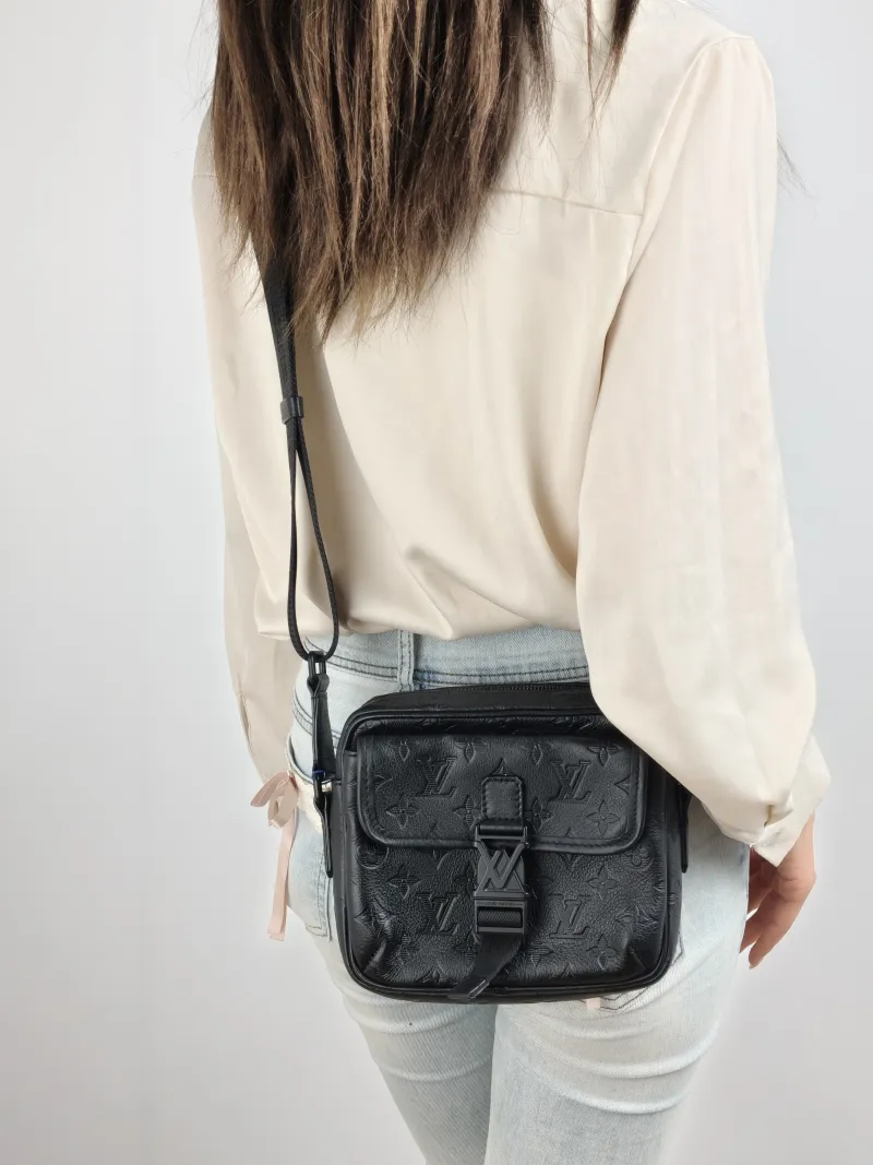 Louis Vuitton Crossbody Bag Getaway Messenger Bag Black Calfskin One Size 18 × 7.8 × 17 cm — on-model view 2 of 2