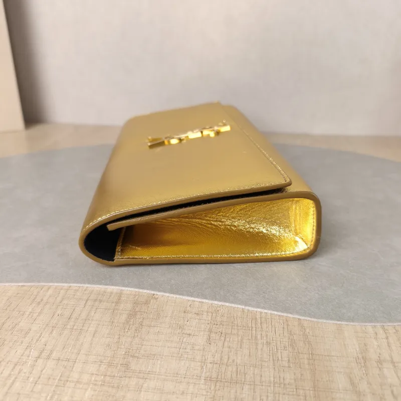 SAINT LAURENT Clutch Clutch Gold Calfskin 27 × 4 × 13 cm — detail view 8 of 12