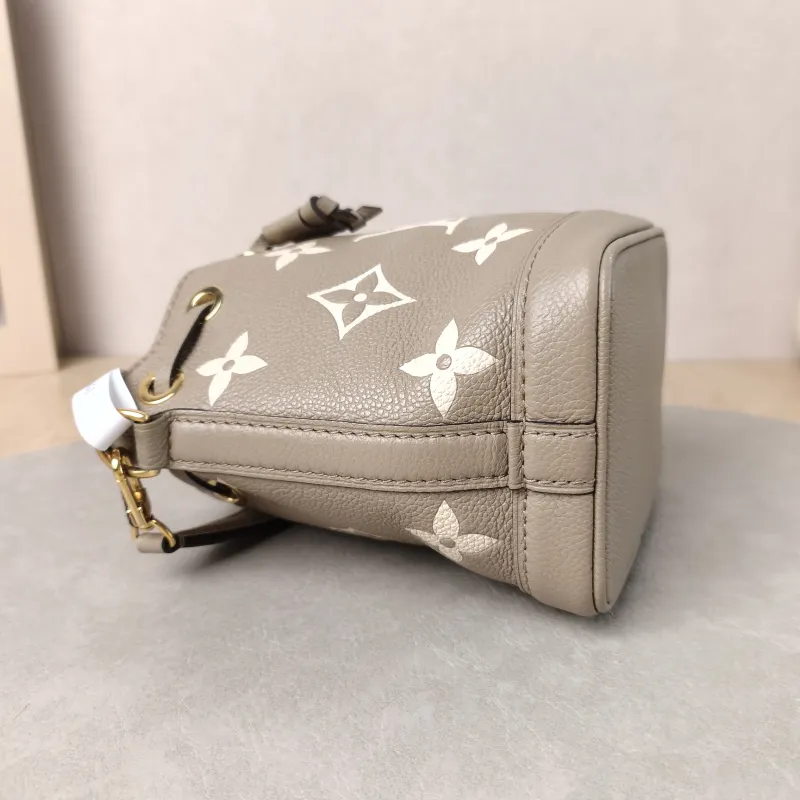 Louis Vuitton Crossbody Bag NANO NOÉ Bucket Bag Nano · White Monogram Empreinte Embossed Calfskin nano 13 × 10 × 16 cm — detail view 6 of 11