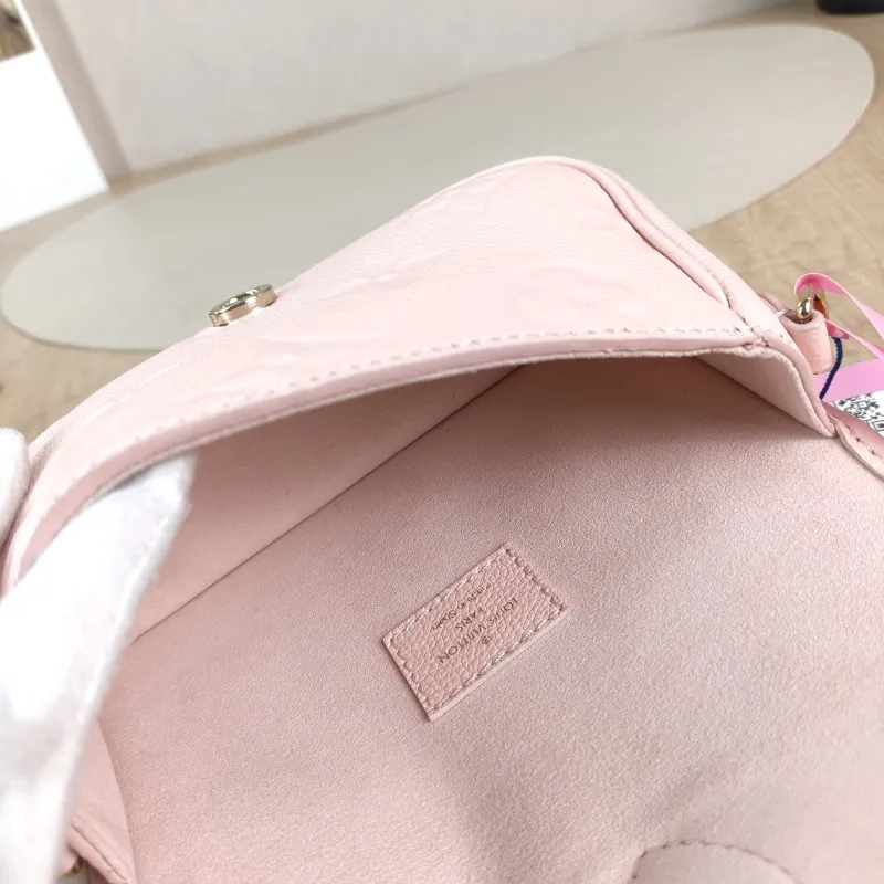 Louis Vuitton Crossbody Bag Diane Baguette Bag Monogram Empreinte Embossed Calfskin nano 19 × 6 × 10.5 cm — detail view 12 of 13