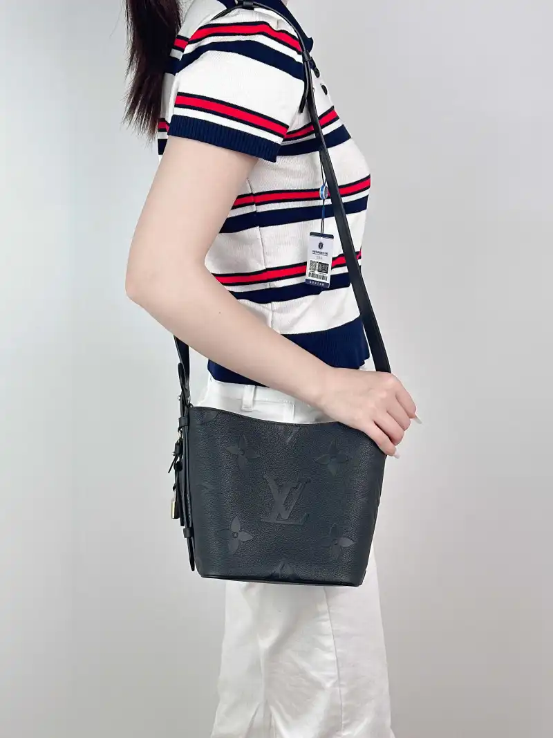 Louis Vuitton Top Handle Bag ALL IN BB Black Empreinte Embossed Calfskin BB 16 × 12 × 18 cm — on-model view 2 of 3