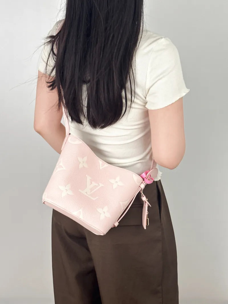 Louis Vuitton Top Handle Bag ALL IN BB · White Empreinte Embossed Calfskin BB16 × 12 × 18 cm — on-model view 2 of 2