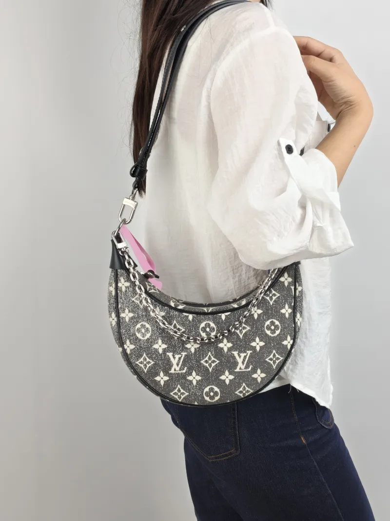 Louis Vuitton Crossbody Bag Loop Grey Small 23 × 6 × 13 cm — on-model view 1 of 2