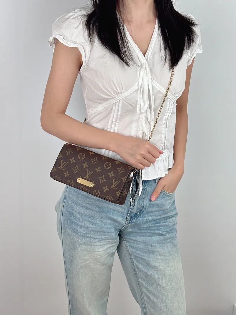 Louis Vuitton Crossbody Bag LILY Chain Bagwoc Monogram PVC 21 × 3.5 × 10.5 cm — on-model view 1 of 2