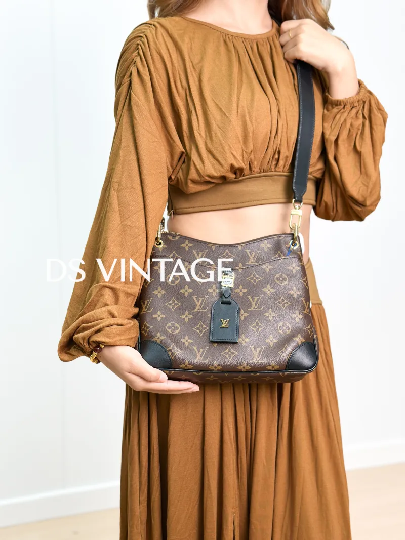 Louis Vuitton Crossbody Bag ODEON Monogram PVC Small 24 × 8 × 22 cm — on-model view 1 of 3