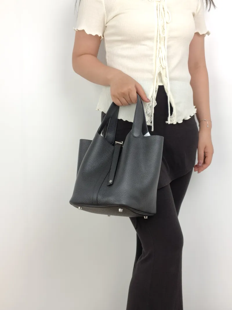 Hermès Top Handle Bag Picotin Lock 22 22Black TC Calfskin Medium22 × 18 × 21 cm — on-model view 2 of 2
