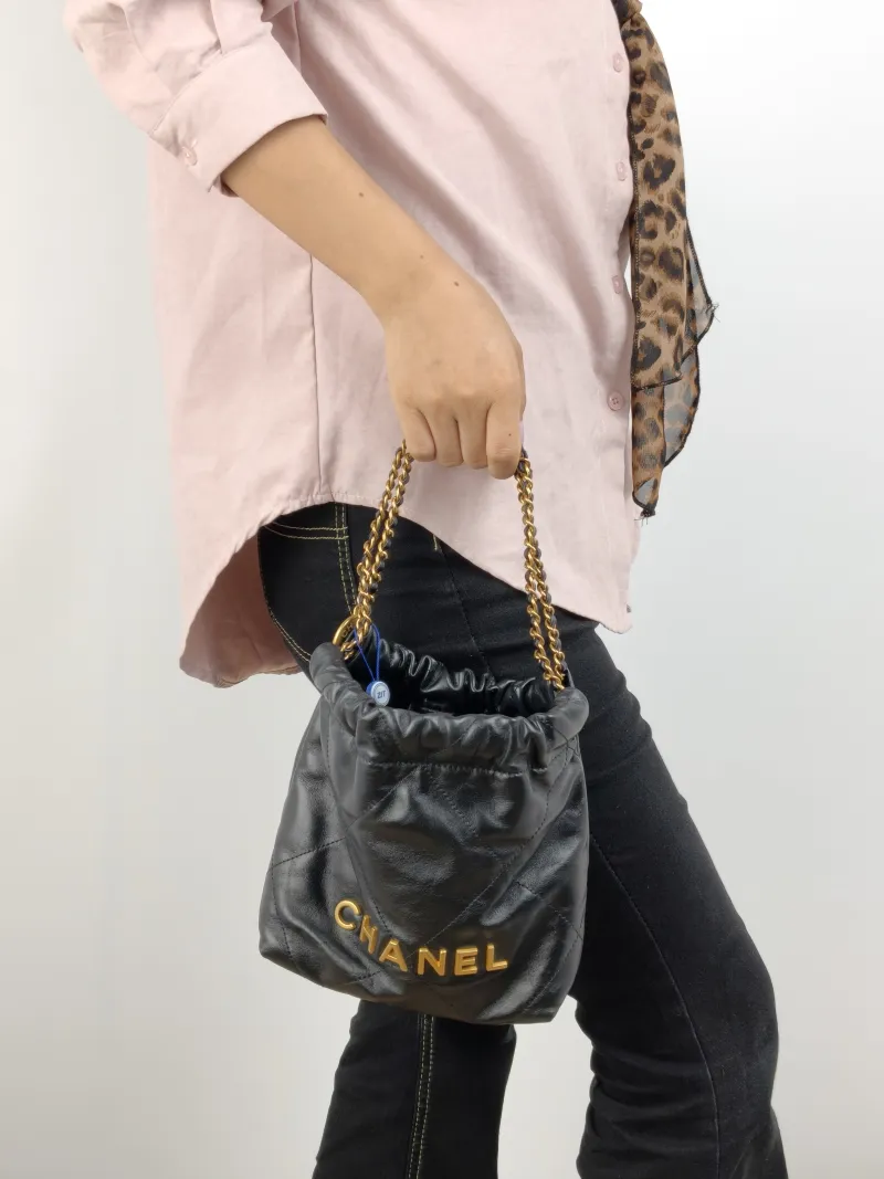 Chanel Shoulder Bag 22Bag Black CC alfskin Mini 20 × 6 × 19 cm — on-model view 1 of 2