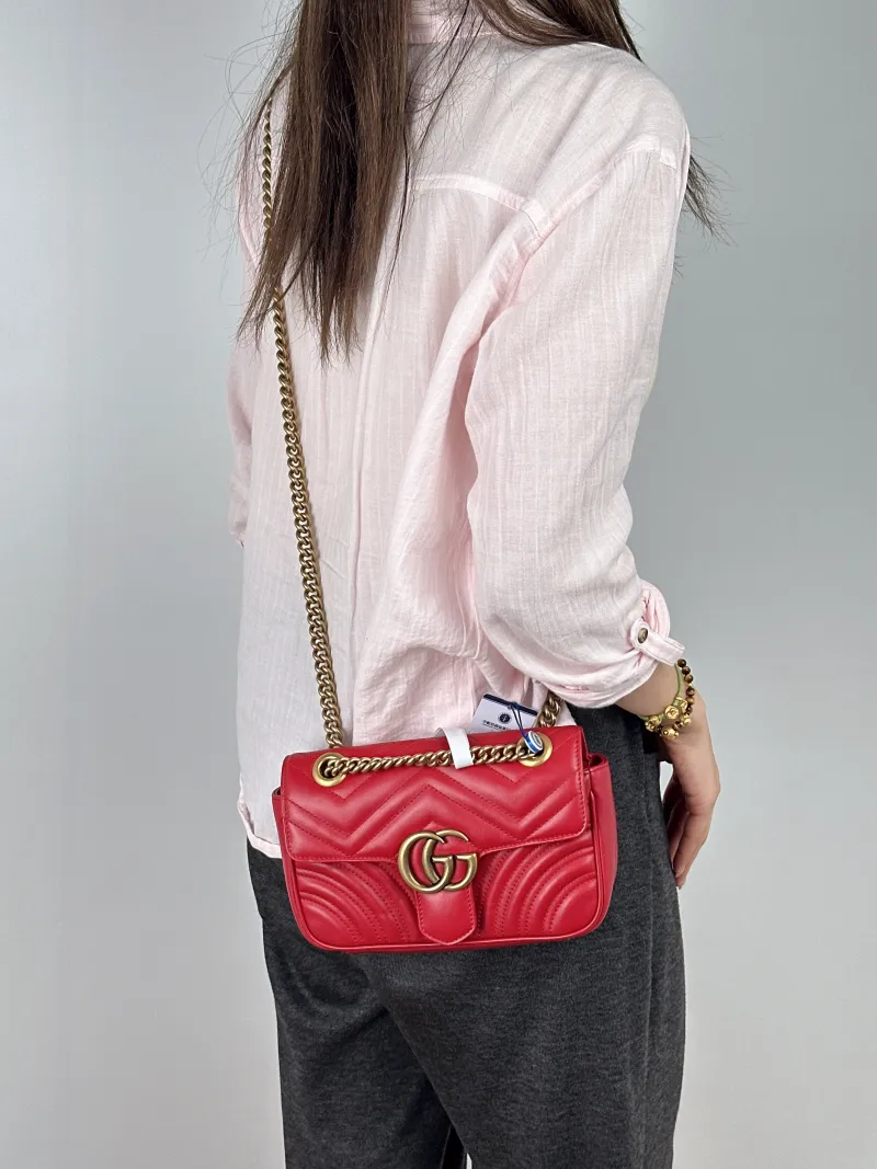 GUCCI Crossbody Bag GG Marmont Small Marmont 22Red Calfskin Small22 × 6 × 13 cm — on-model view 2 of 2