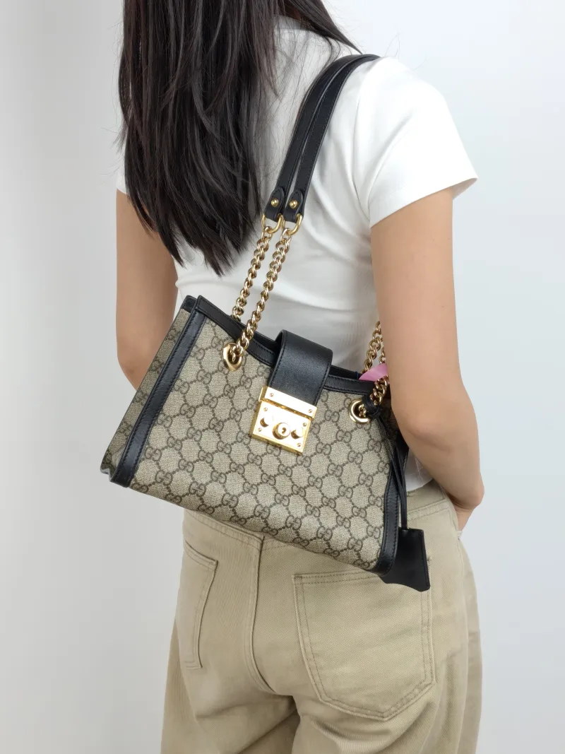 GUCCI Shoulder Bag Padlock Tote Black Monogram PVC Medium 26 × 10 × 18 cm — on-model view 1 of 2