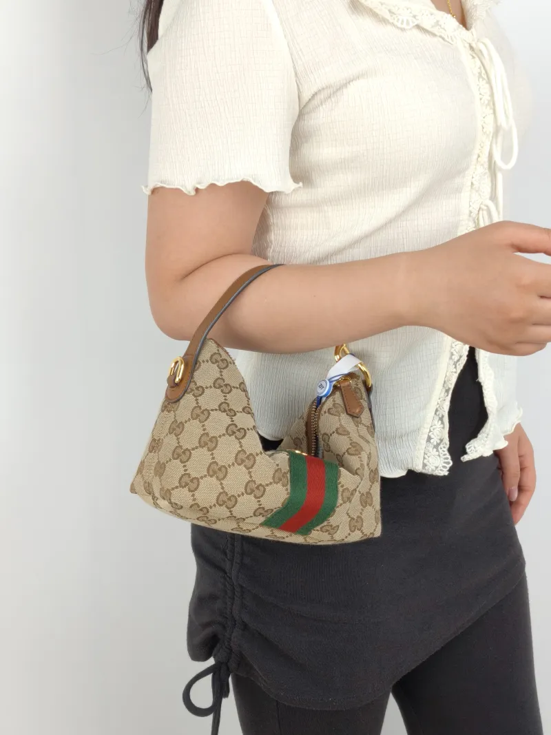 GUCCI Top Handle Bag vanity Vanity Case Bag Monogram Canvas Mini 19 × 9 × 10 cm — on-model view 1 of 2