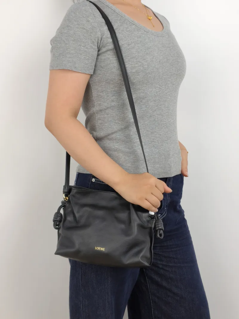 LOEWE Crossbody Bag Flamenco Black Calfskin Mini 24 × 9 × 18 cm — on-model view 2 of 2