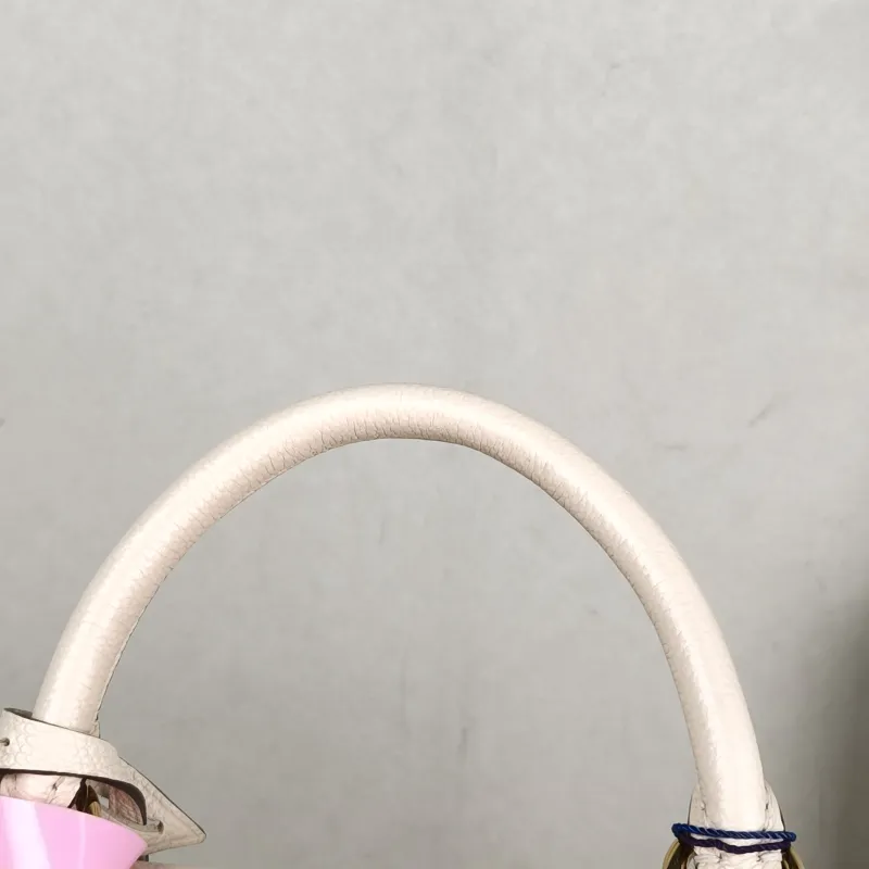 Louis Vuitton Crossbody Bag MADELEINE White Monogram Empreinte Embossed Calfskin BB 24 × 8.5 × 17 cm — detail view 4 of 14