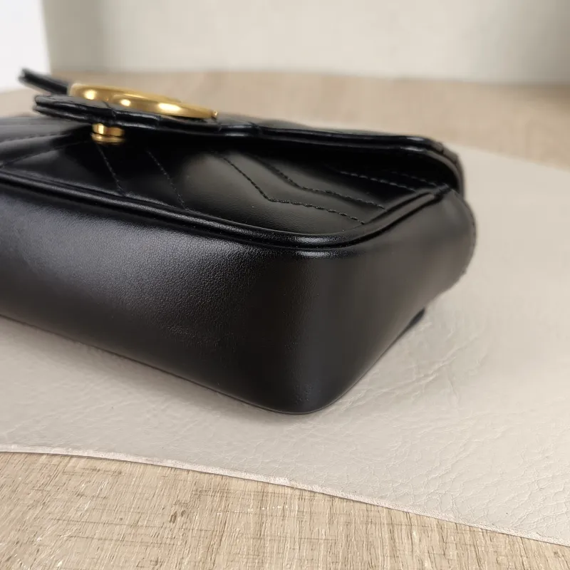 GUCCI Crossbody Bag GG Marmont Mini Marmont Mini Black Calfskin Mini 16.5 × 4.5 × 9.5 cm — detail view 1 of 8