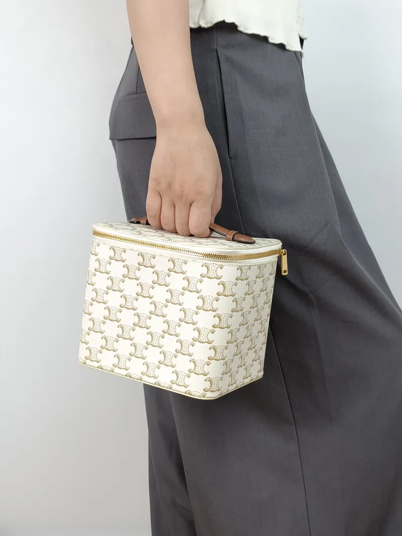 CELINE Cosmetic Bag White PVC One Size18 × 14.5 × 15 cm — on-model view 2 of 2