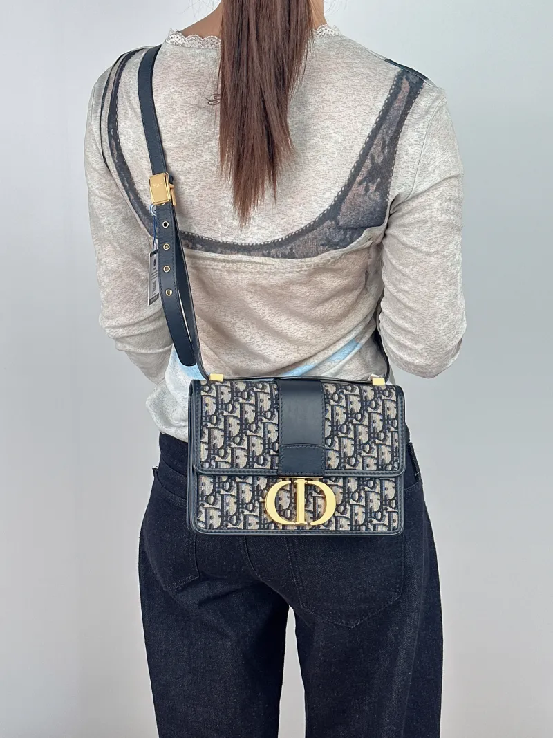 DIOR Crossbody Bag30Montaigne 30 Edition Canvas Medium24 × 8 × 17 cm — on-model view 1 of 2