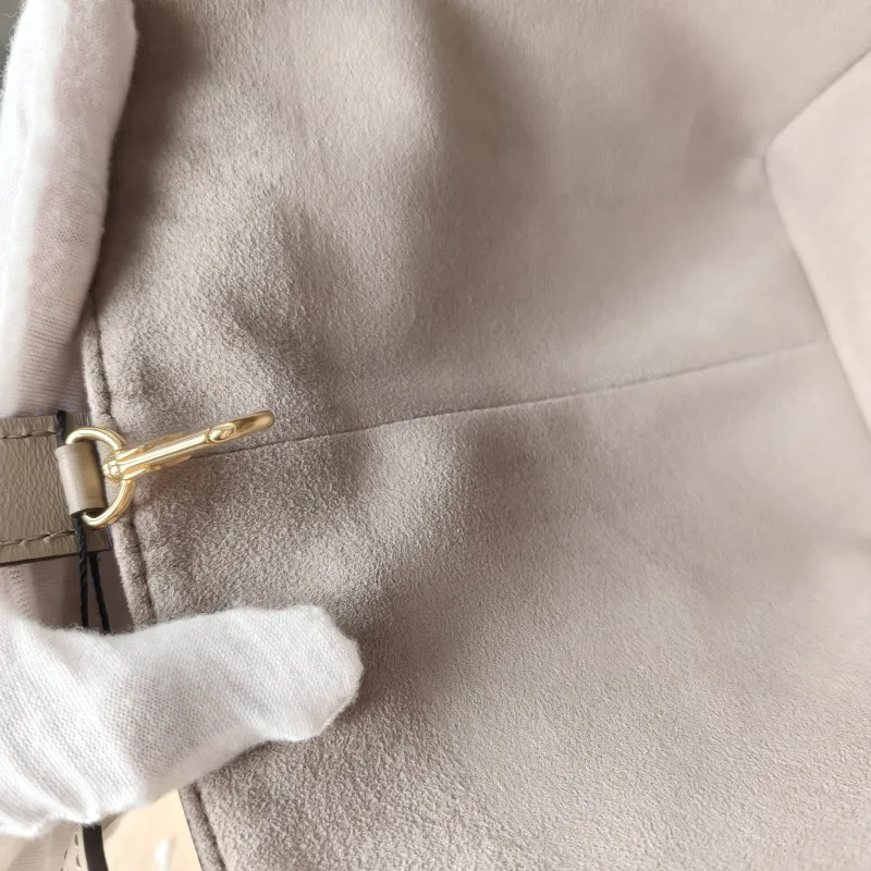 Louis Vuitton Top Handle Bag ALL IN BB · White Empreinte Embossed Calfskin BB 16 × 12 × 18 cm — detail view 7 of 14