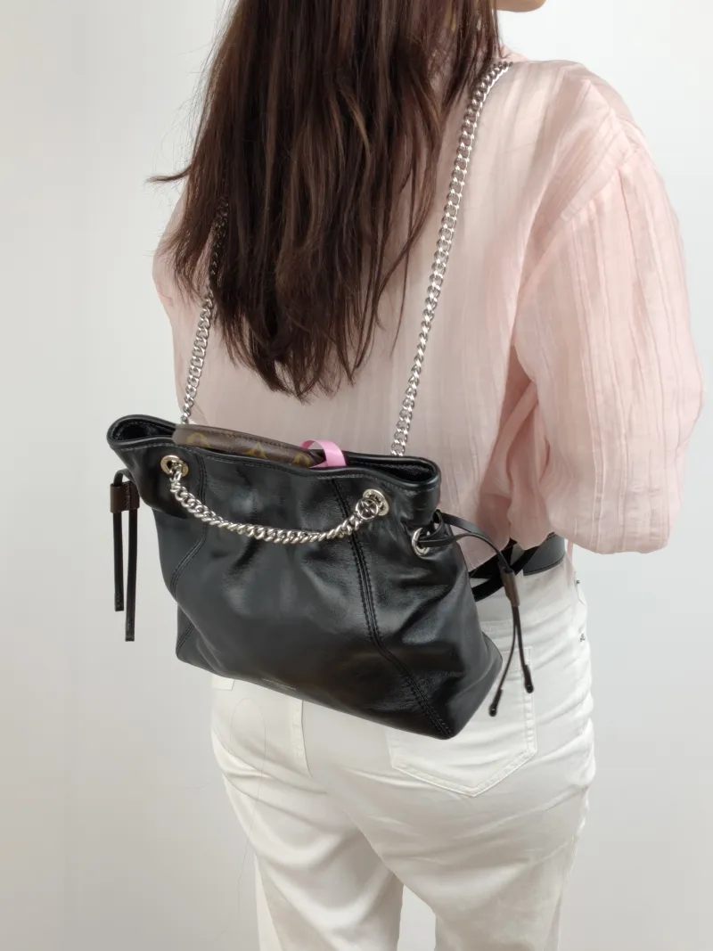 Louis Vuitton Backpack Off Duty Vibe Backpack Black SL ambskin One Size 24 × 10 × 25 cm — on-model view 1 of 3