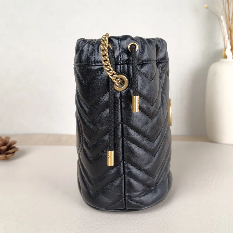 GUCCI Crossbody Bag GG Marmont Marmont Bucket Bag Black with Gold-Tone Hardware Calfskinmini13 × 10 × 17.5 cm — detail view 8 of 11