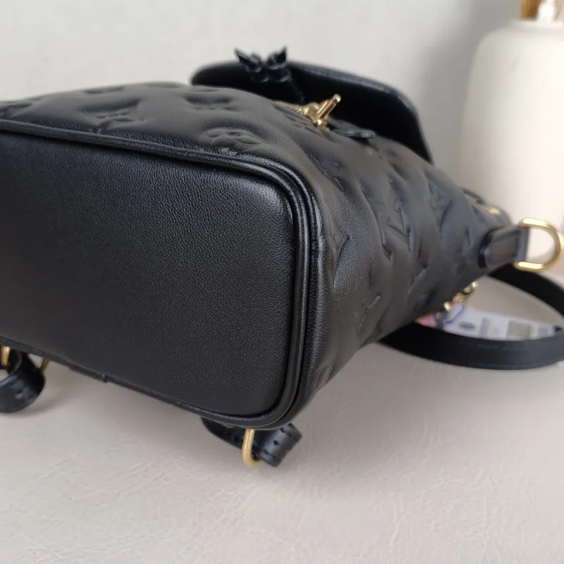 Louis Vuitton Backpack Coussin Backpack Black with Gold-Tone Hardware Lambskin Mini 15 × 7.5 × 20 cm — detail view 12 of 14