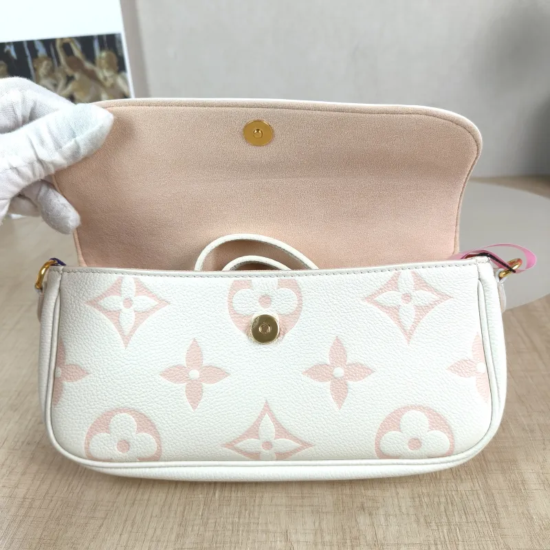 Louis Vuitton Crossbody Bag IVY White · Pink Monogram Empreinte Embossed Calfskin Small 23.5 × 4.3 × 12 cm — detail view 10 of 11