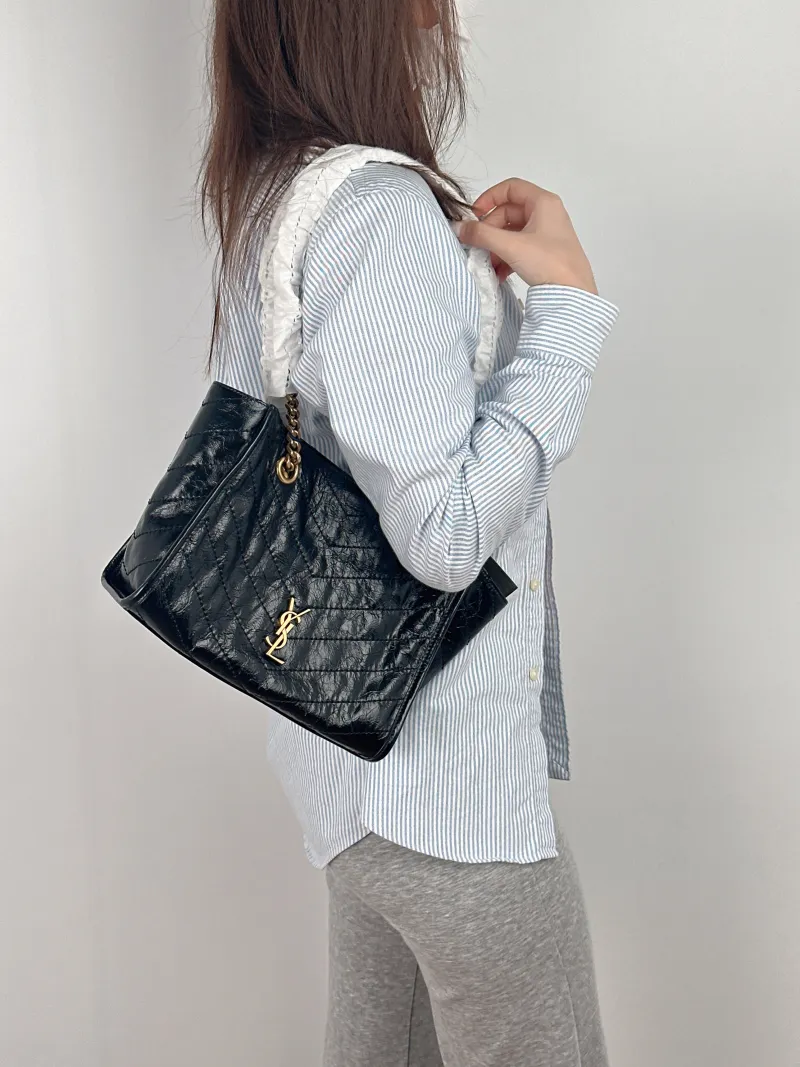 SAINT LAURENT Shoulder Bag Niki Shopping Tote Black Calfskin Small 25 × 10 × 19 cm — on-model view 2 of 2