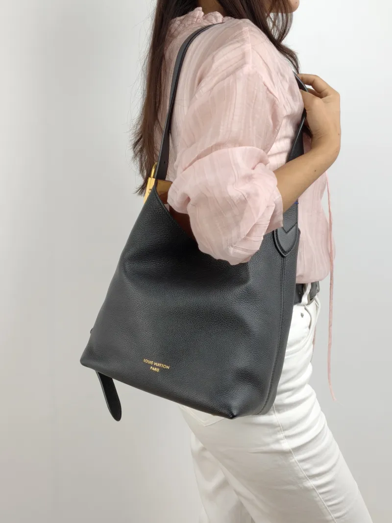 Louis Vuitton Shoulder Bag Low Key Hobo Shoulder Bag Black Calfskin Small 24 × 16 × 28 cm — on-model view 1 of 2