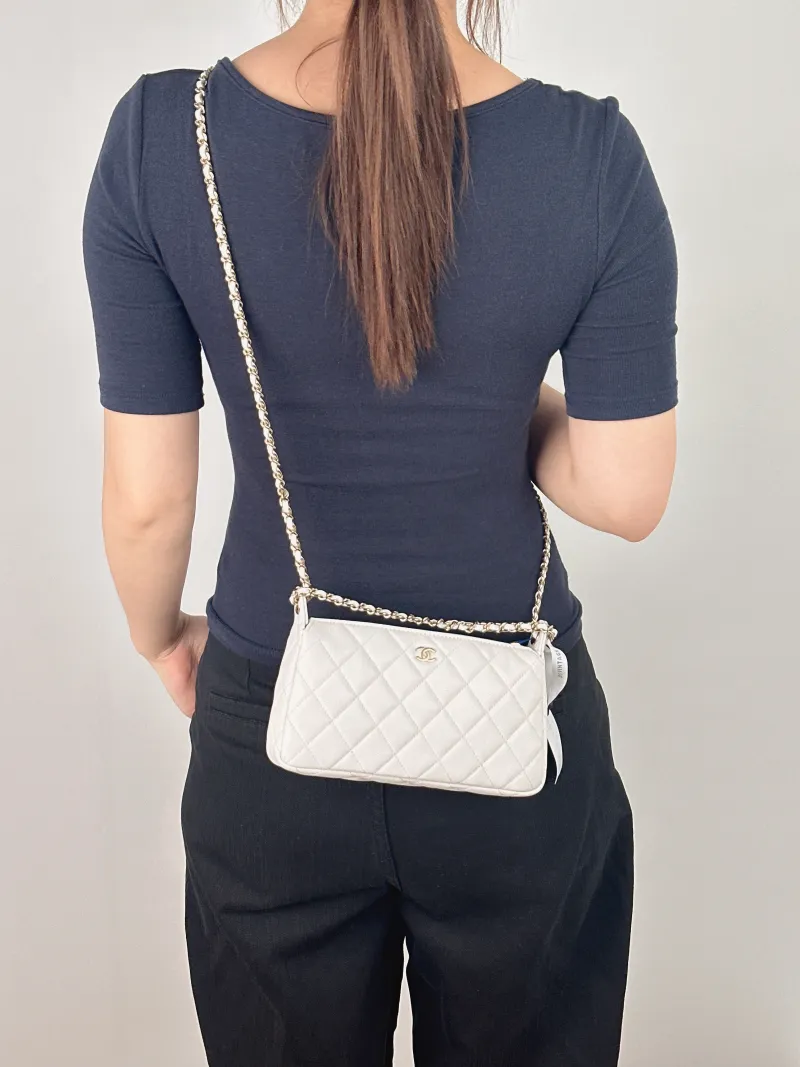Chanel Crossbody Bag White Gold Grained Calfskin One Size 21 × 5 × 12 cm — on-model view 1 of 2