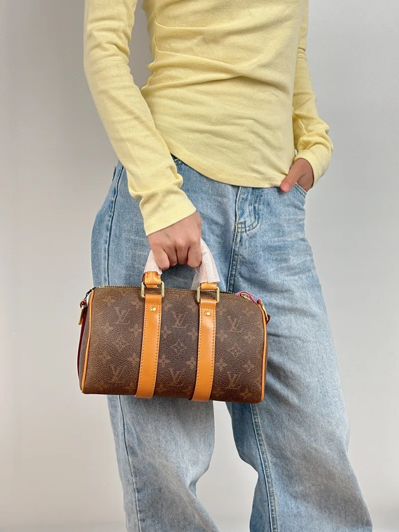 Louis Vuitton Crossbody Bag Keepall 25 Edition Brown PVC Medium 25 × 11 × 15 cm — on-model view 1 of 3