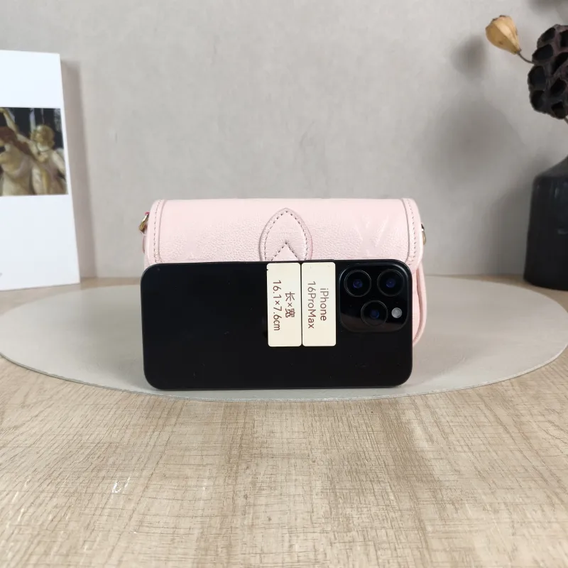Louis Vuitton Crossbody Bag Diane Baguette Bag Monogram Empreinte Embossed Calfskin nano 19 × 6 × 10.5 cm — cover view 3 of 5
