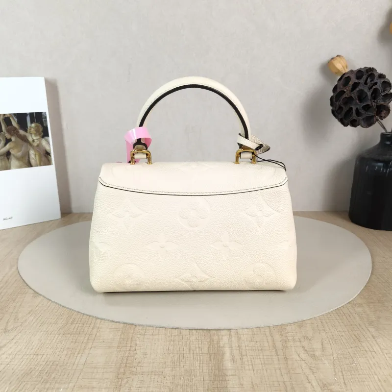 Louis Vuitton Crossbody Bag MADELEINE Beige Monogram Empreinte Embossed Calfskin BB 24 × 8.5 × 17 cm — cover view 3 of 5
