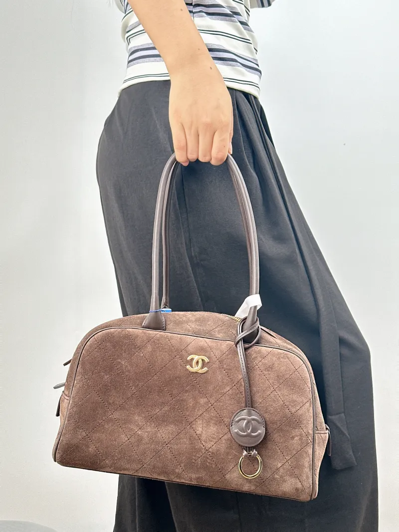 Chanel Shoulder Bag Bowling Bag Brown Suede Medium 30 × 9 × 17 cm — on-model view 1 of 2