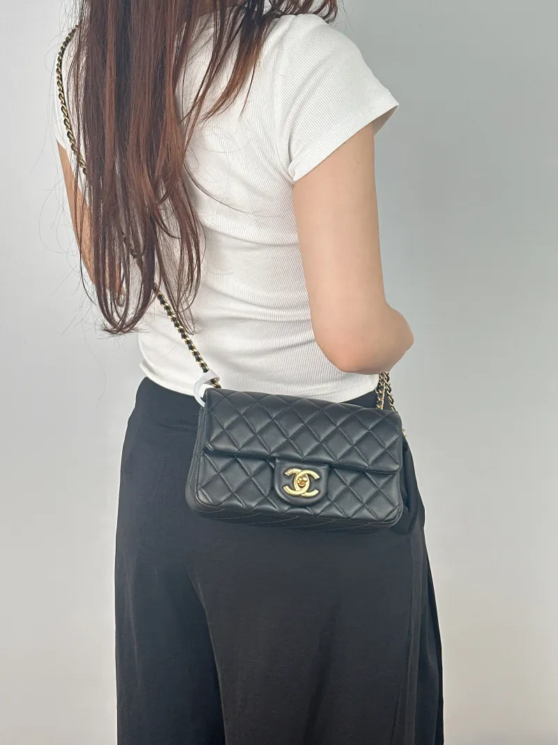 Chanel Crossbody Bag c mini Black Lambskin mini20 × 6 × 12 cm — on-model view 1 of 2