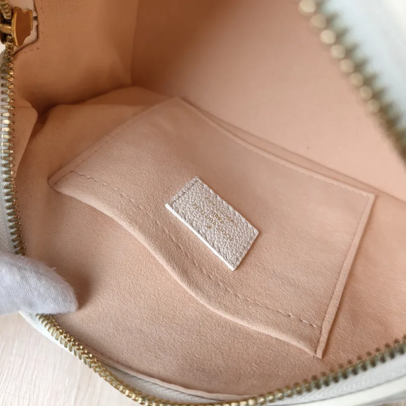 Louis Vuitton Crossbody Bag Speedy20 · Pink Monogram Empreinte Embossed Calfskin Small 20.5 × 12 × 13.5 cm — detail view 1 of 13