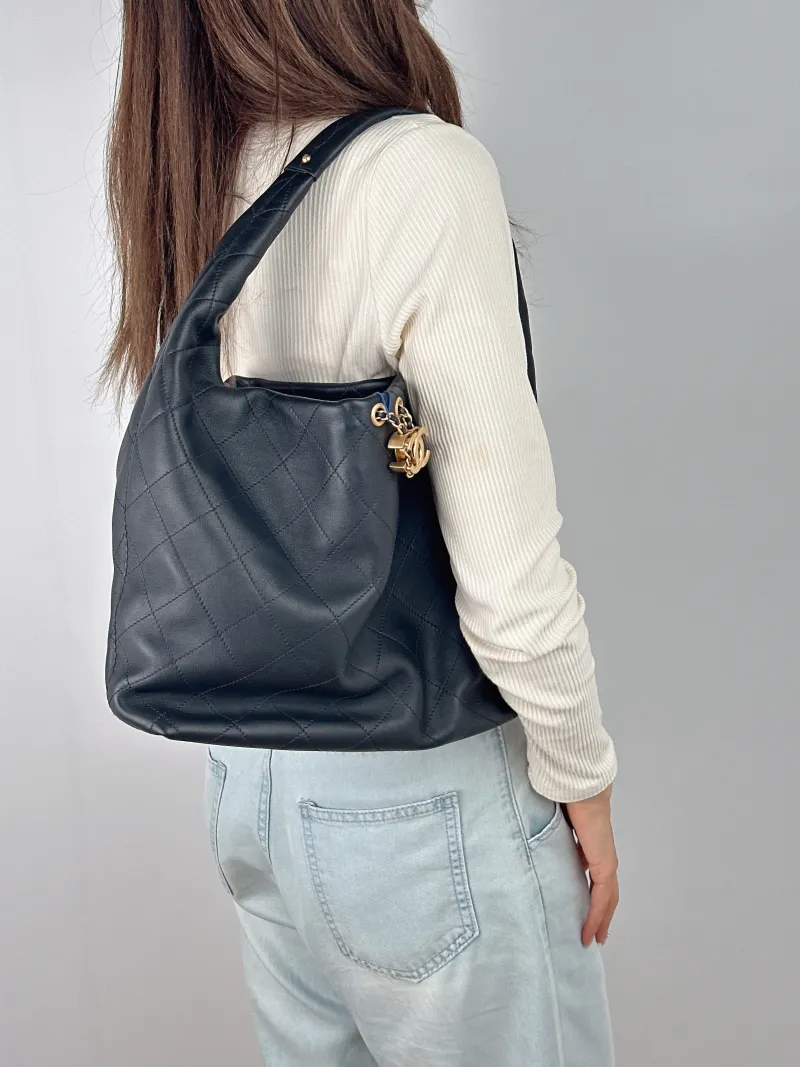 Chanel Crossbody Bag 26c hobo Black Calfskin Large 37 × 8 × 30 cm — on-model view 2 of 2