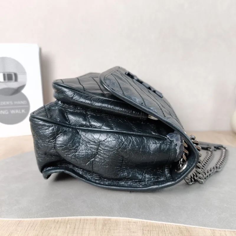 SAINT LAURENT Crossbody Bag Niki Green Waxed Leather Medium 28 × 8.5 × 20 cm — detail view 11 of 15