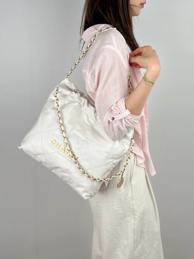Chanel Shoulder Bag22Bag White CC alfskin Small35 × 7 × 37 cm — on-model view 2 of 2