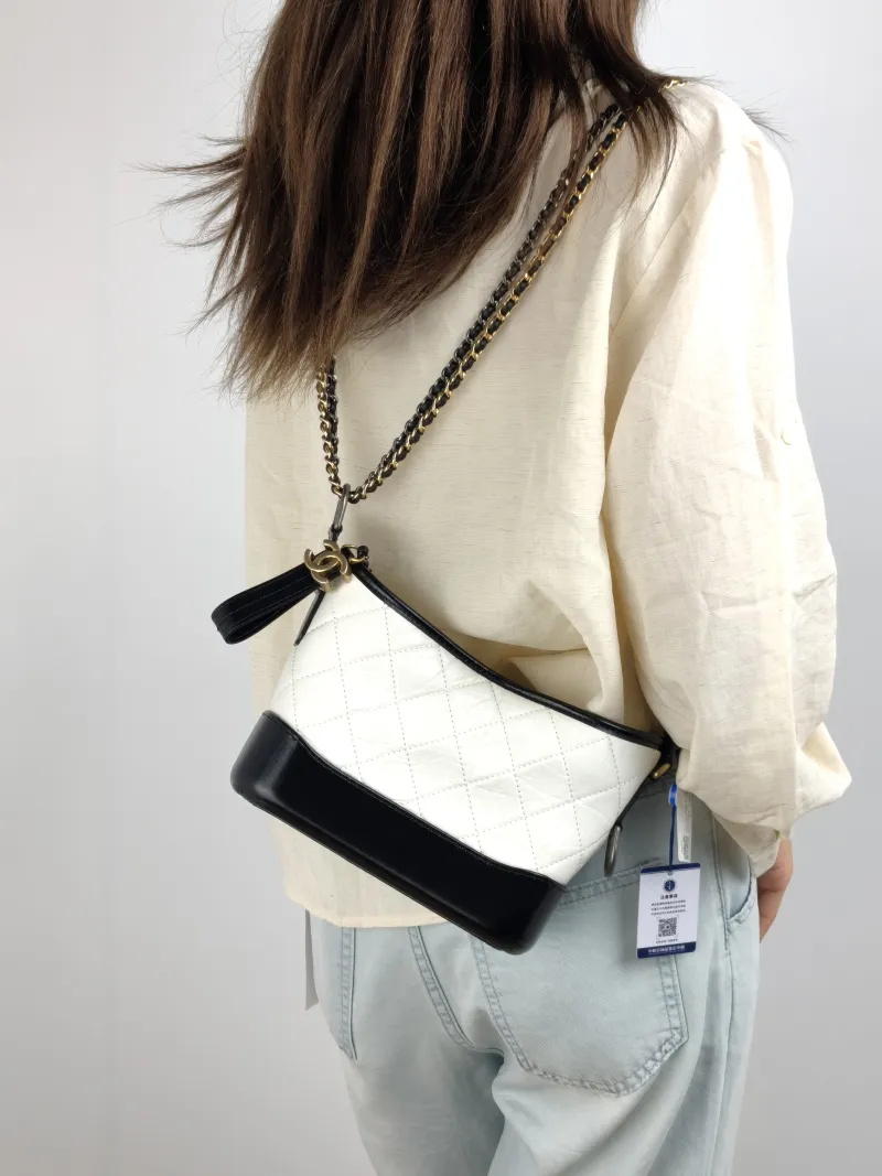 Chanel Crossbody Bag Gabrielle Gabrielle Bag CC alfskin Small 20 × 8 × 15 cm 29 — on-model view 2 of 2