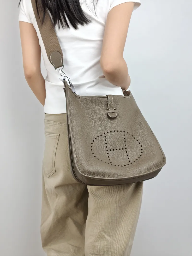 Hermès Crossbody Bag Evelyne 29 29 Taurillon Clemence TC Calfskin Small 29 × 8 × 30 cm W — on-model view 1 of 2