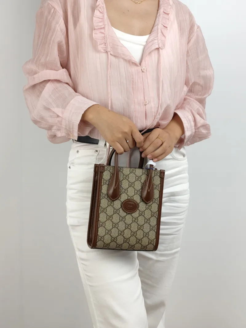 GUCCI Crossbody Bag GG Retro Collection Tote Bag Brown PVC Mini 16 × 7 × 20 cm — on-model view 2 of 2