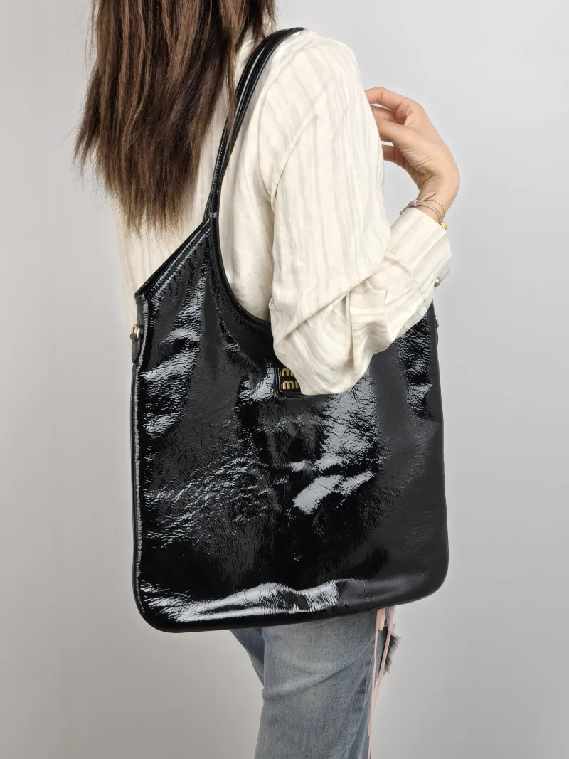 Miumiu Shoulder Bag IVY Tote Shopping Tote Black Patent Leather Medium 35*40 — on-model view 1 of 2