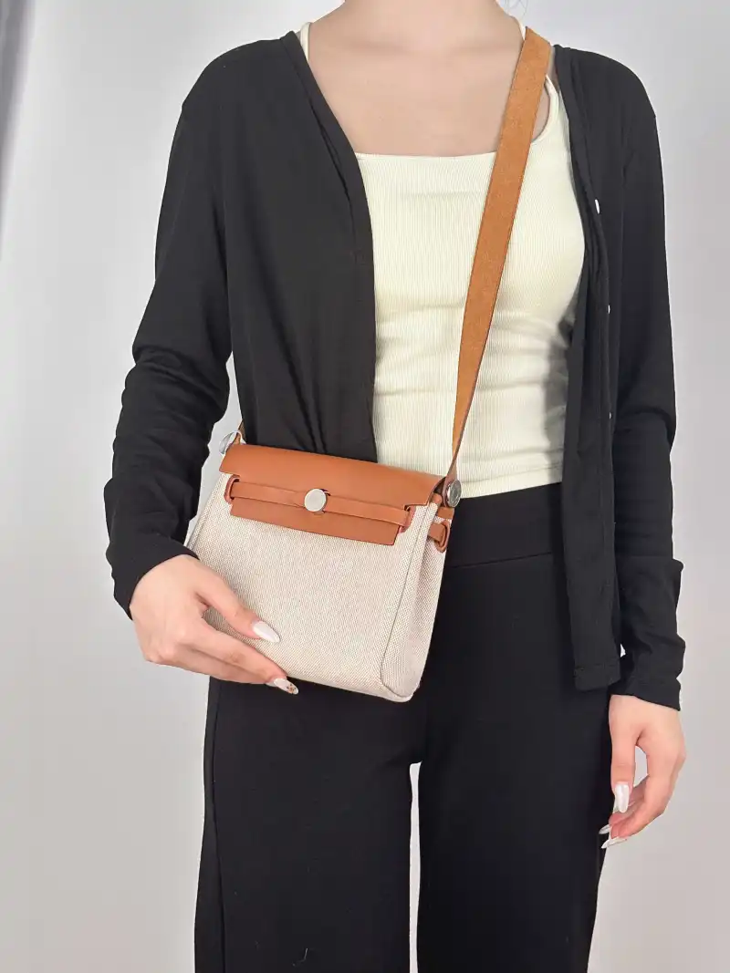 Hermès Shoulder Bag Herbag Zip 20 Beige Canvas mini20 × 7 × 17 cm — on-model view 1 of 2
