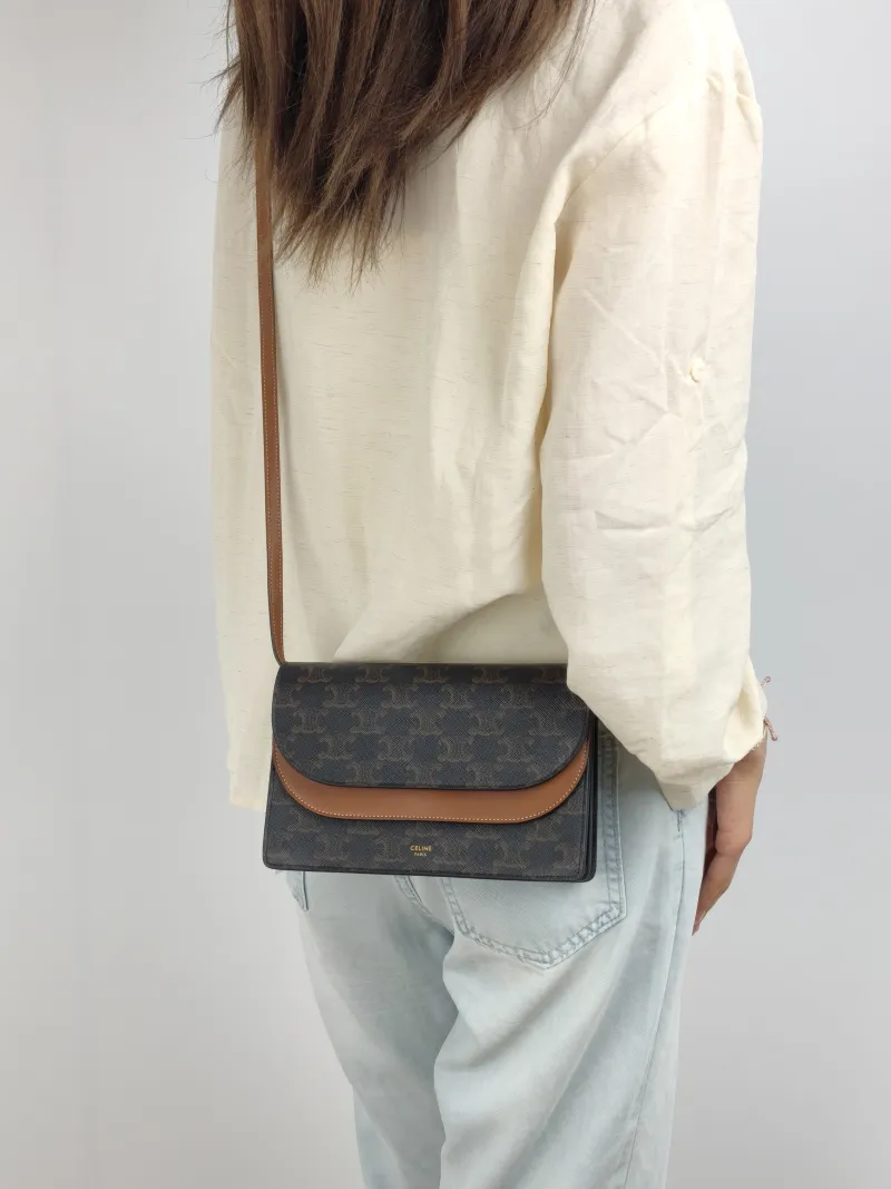 CELINE Crossbody Bag TRIOMPHE Clutchwoc Monogram PVC 20 × 6 × 12 cm — on-model view 1 of 2