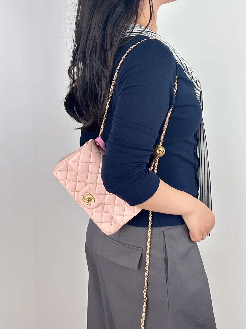 Chanel Crossbody Bag mini Pink Lambskin One Size 20 × 6 × 12 cm — on-model view 1 of 2