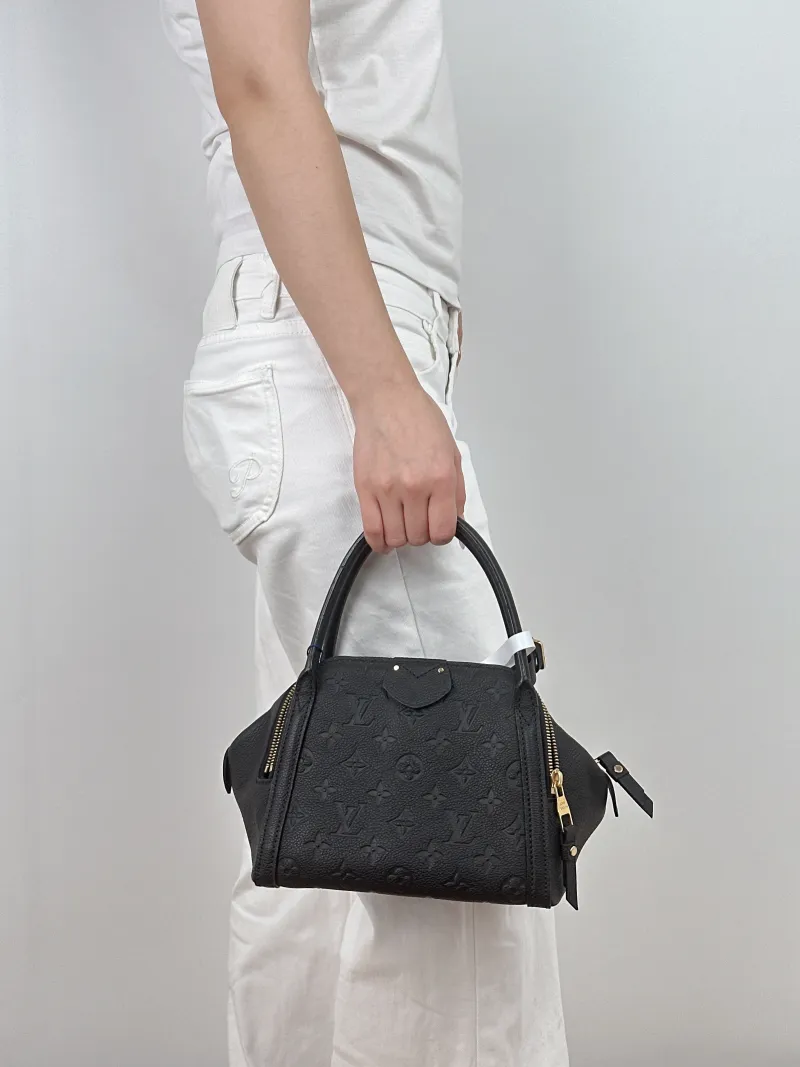 Louis Vuitton Top Handle Bag Top Handle Bag Black Calfskin One Size 21 × 15 × 16 cm — on-model view 1 of 2